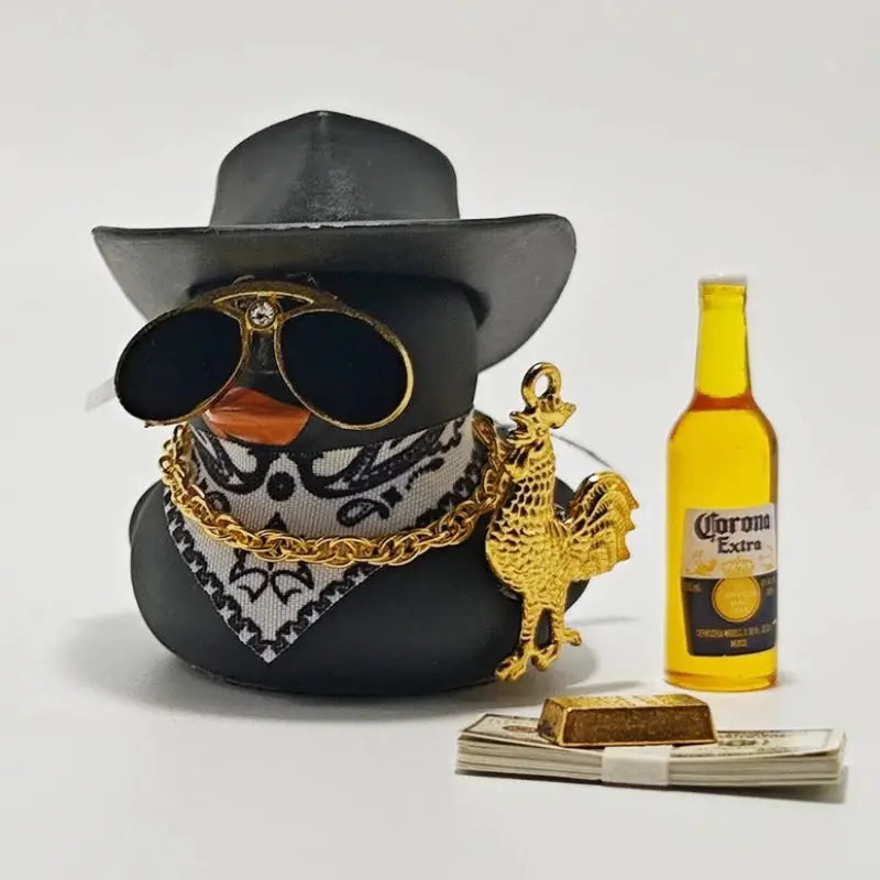 Cowboy rubber duck car ornament by Simples Market, black duck with hat, sunglasses, bandana, gold chain and rooster charm