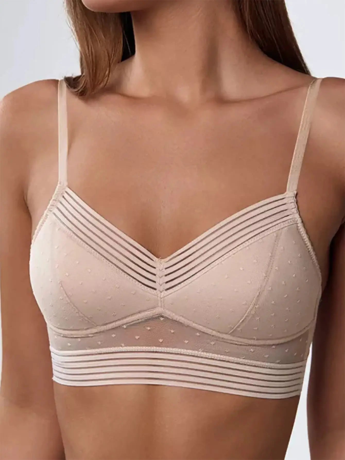Beige lace bralette with dotted texture and striped elastic band
