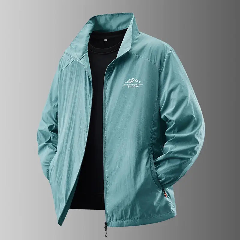 Men's Summer Sun Protection Jacket by Simples Market in teal, ultra-light windbreaker with zip front.