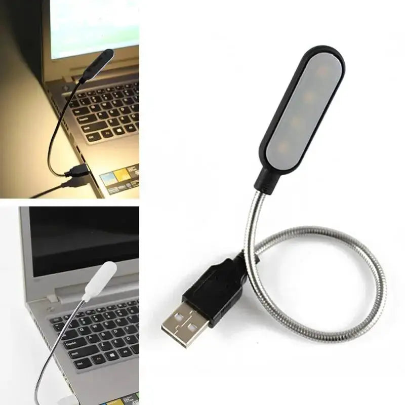 Portable USB book light by Simples Market with flexible gooseneck and oval LED head; USB plug for laptop keyboard lighting.
