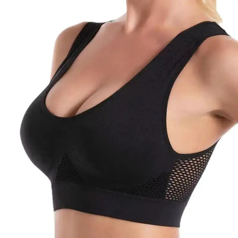 Plus-size black grid air-holes sports bra with mesh side panels, wire-free for yoga and running
