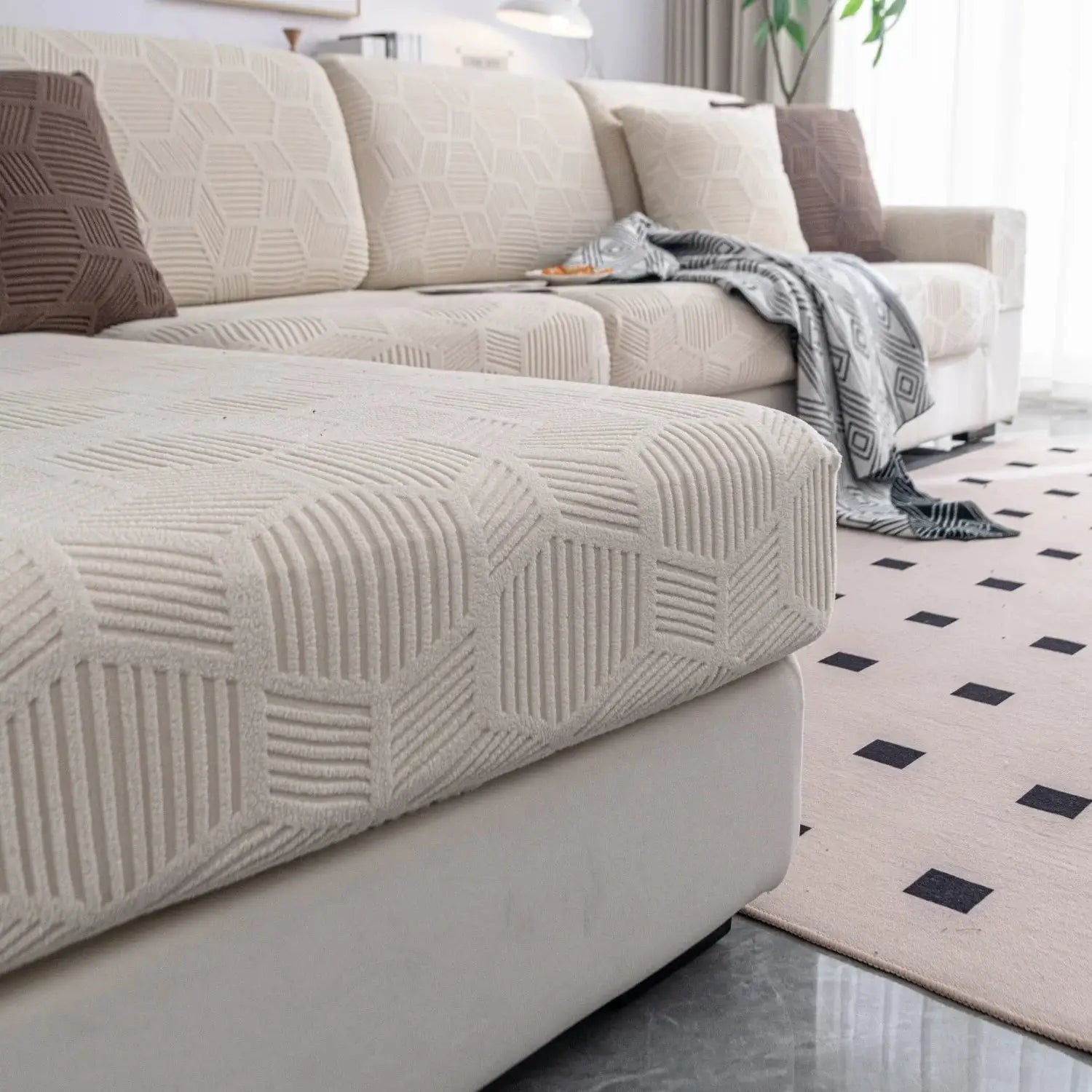 Sofa cover with matching cushion covers in beige jacquard stretch fabric