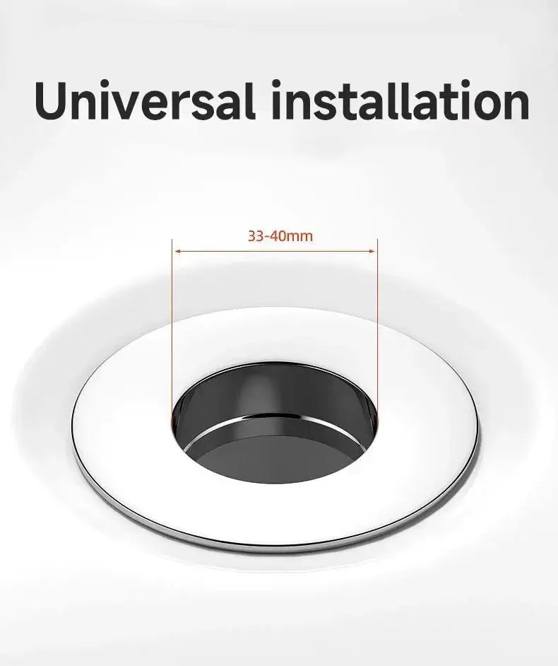 Simples Market universal basin pop-up drain filter; black inner basket with white outer ring, fits 33–40mm drains