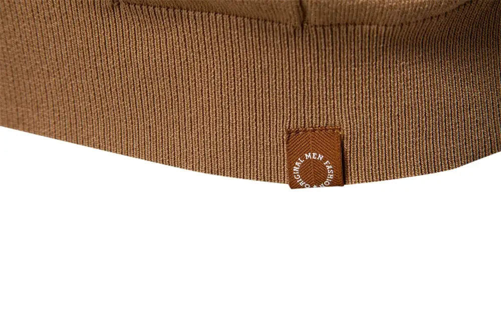 Men's polo shirt in brown knit fabric with ribbed hem and small tag.