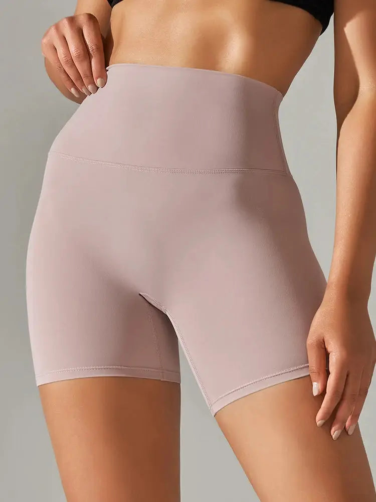 Womens pink high-waist yoga shorts; squat-proof, quick-dry fabric by Simples Market