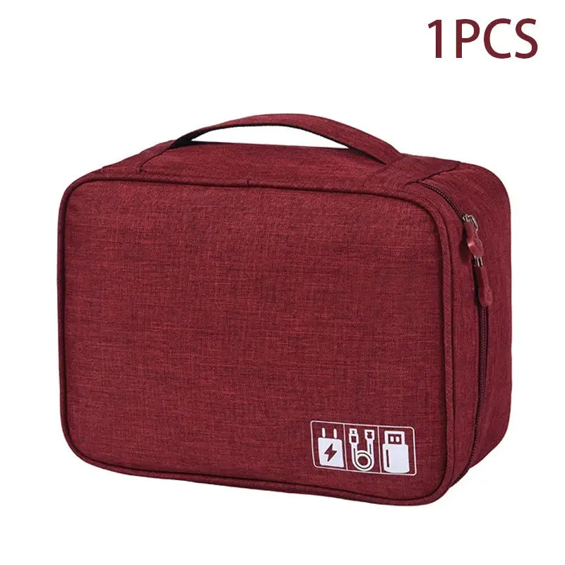 Travel cable storage bag in red, portable waterproof electronics organizer with zipper.