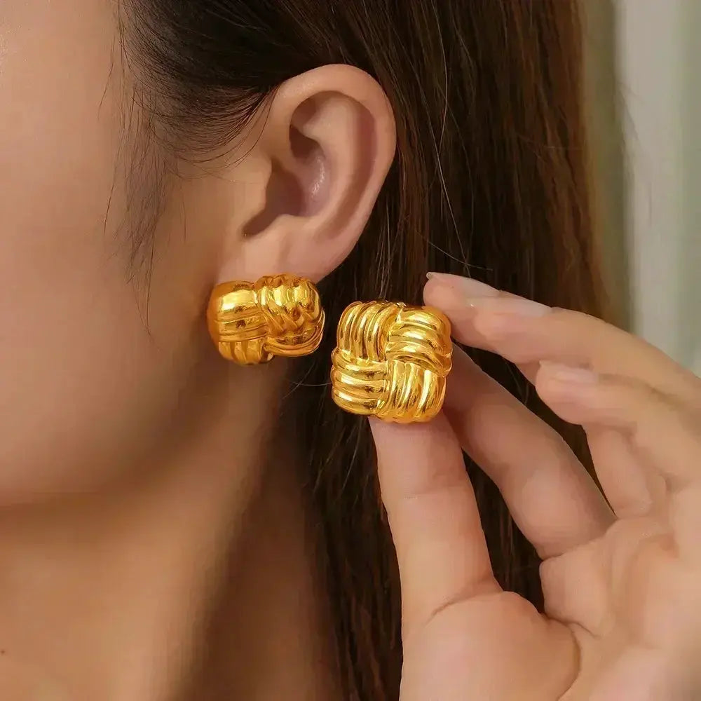 Exaggeration Ocean Style Shell Texture stud earrings, gold-tone pair shown.