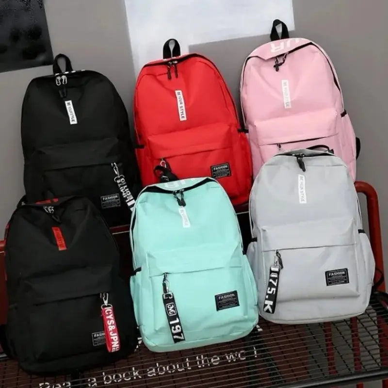 Six Simples Market fashion trend backpacks in black, red, pink, mint green and gray with large capacity
