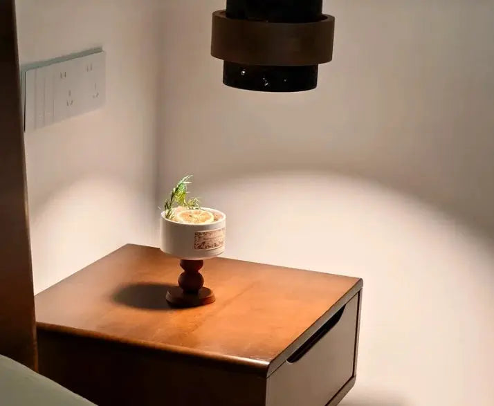 Japanese Wabi Sabi bar pendant lamp by Simples Market, white ceramic shade on a wooden stand