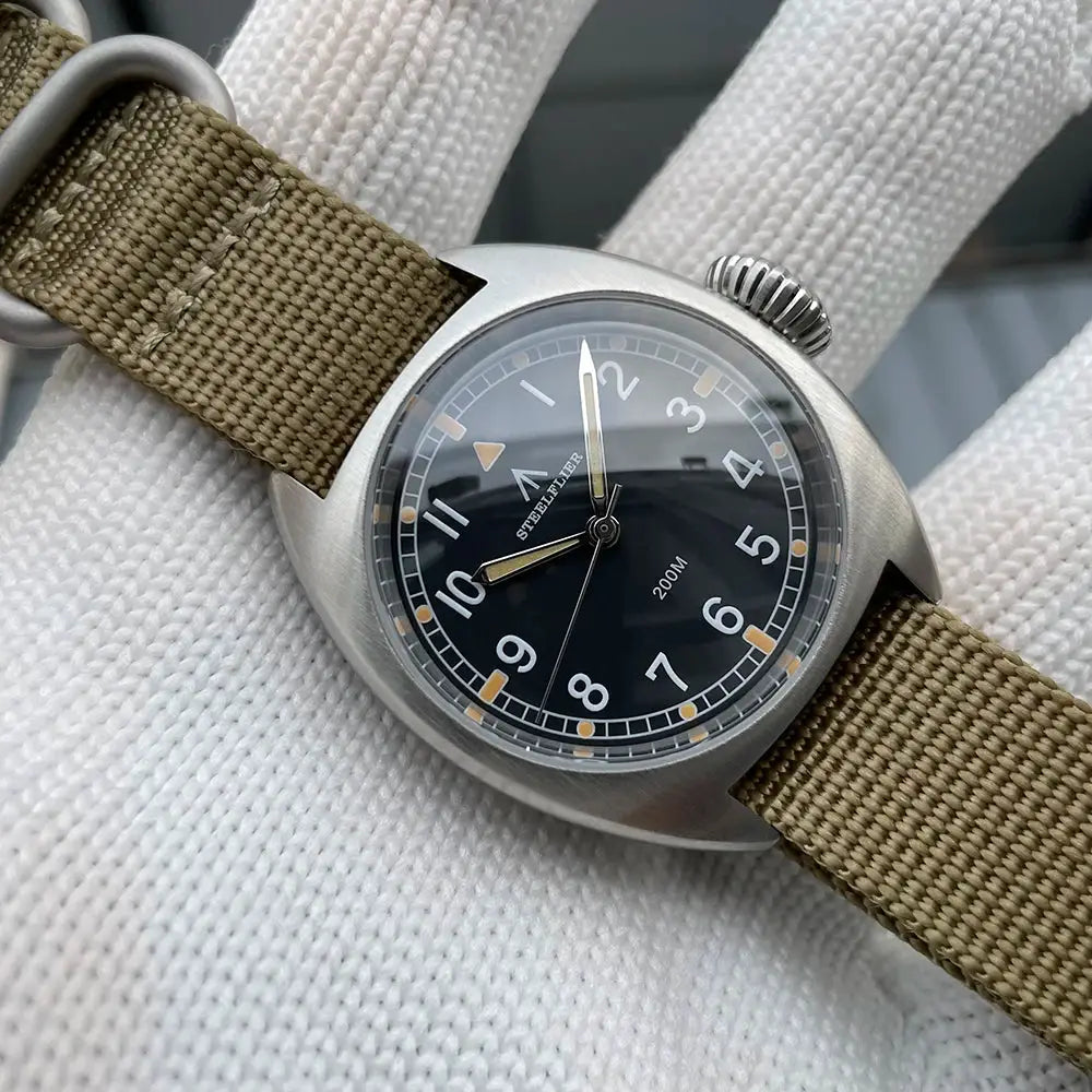 STEELFLIER SF745 wristwatch, black dial with white numerals, beige canvas strap, stainless steel case, 200M waterproof