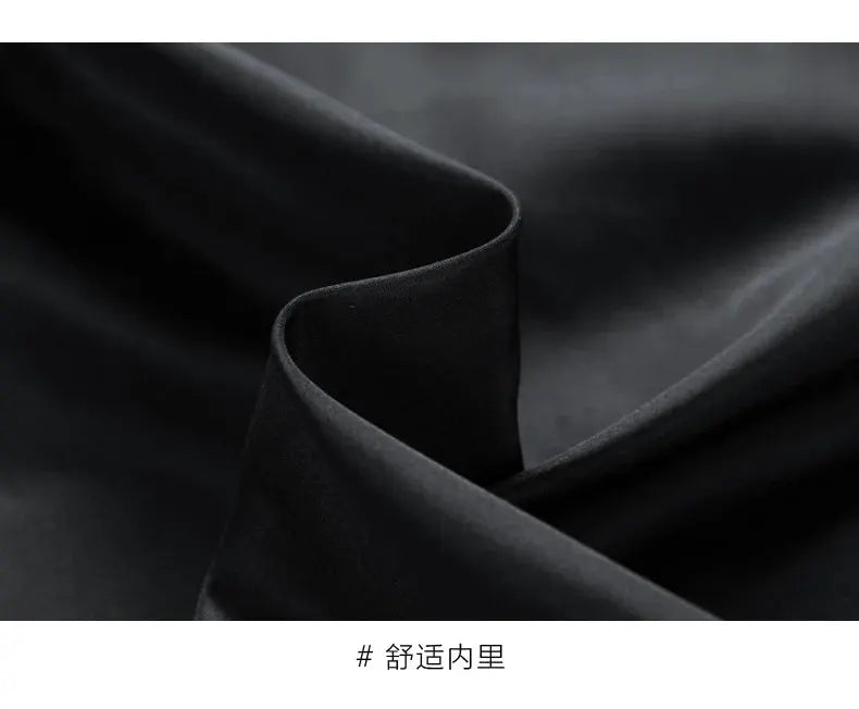 Men's down jacket inner lining in black fabric, close-up texture