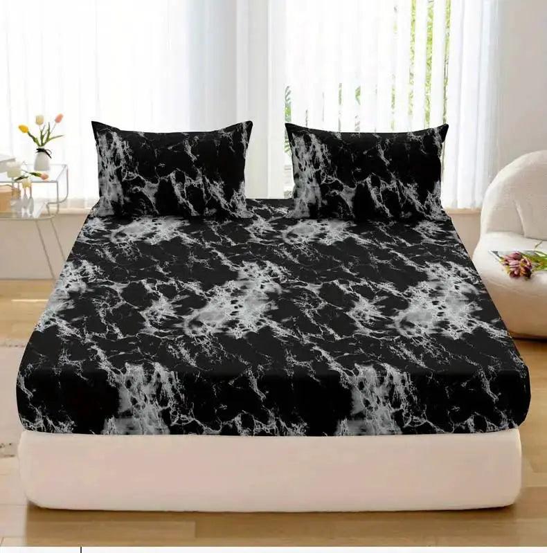 3-Piece marble print fitted sheet set on bed, black-gray microfiber fabric