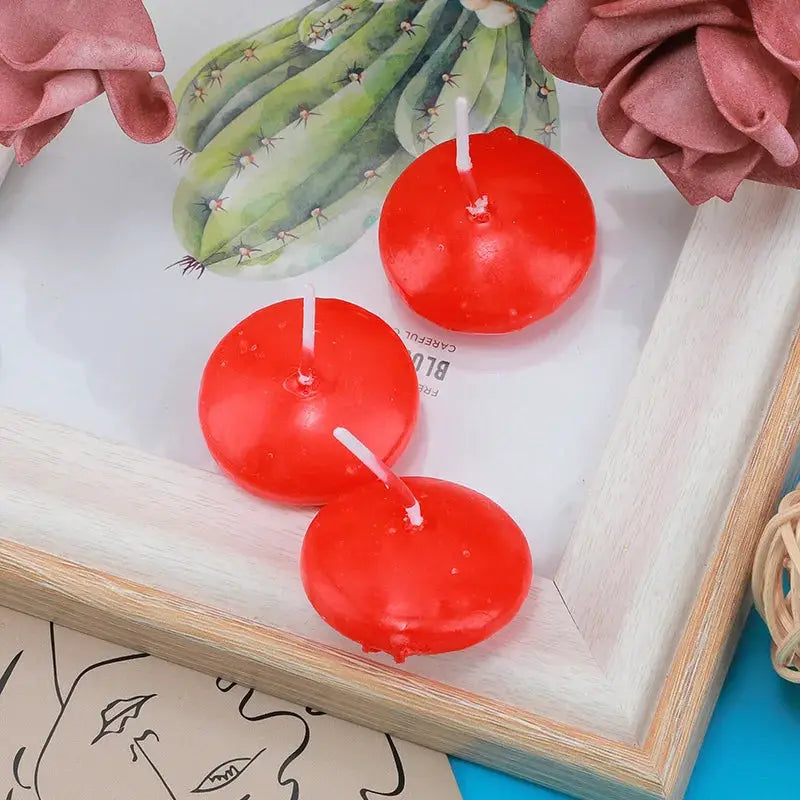 Floating red unscented disc candles, 3 pcs, for Valentine’s Day, weddings, and bath decor.