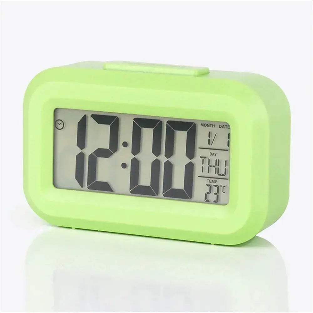 Green LED digital alarm clock with backlight, calendar, date, day, and temperature display for desk or bedside.