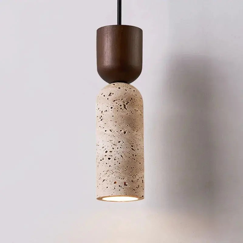 Bedside pendant light in Japanese wabi-sabi style with dark brown top and speckled beige cylindrical shade, warm glow