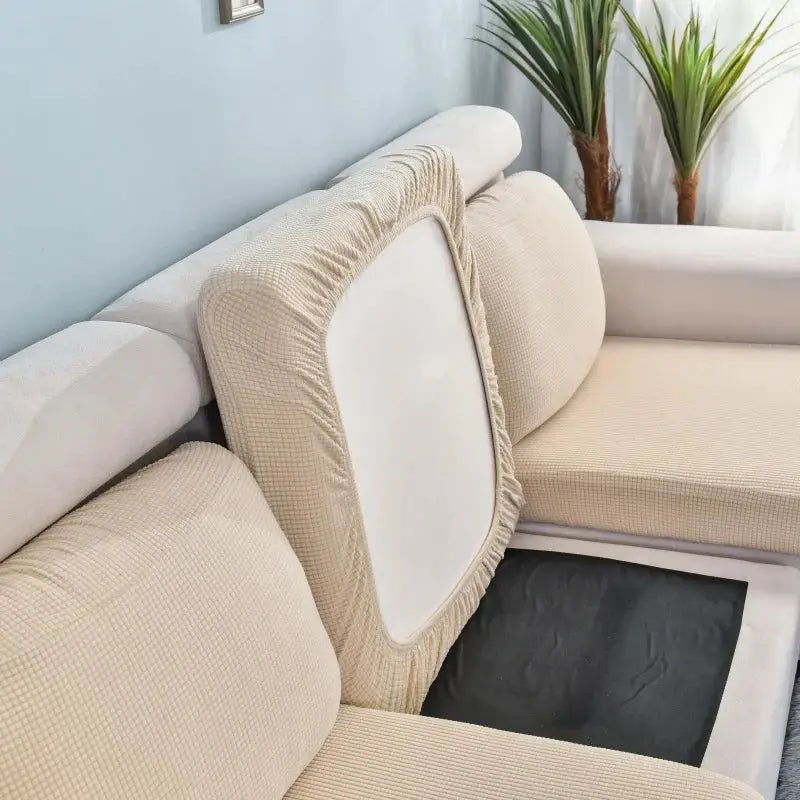 Thick elastic beige sofa cover; solid color furniture protector and removable couch slipcover.