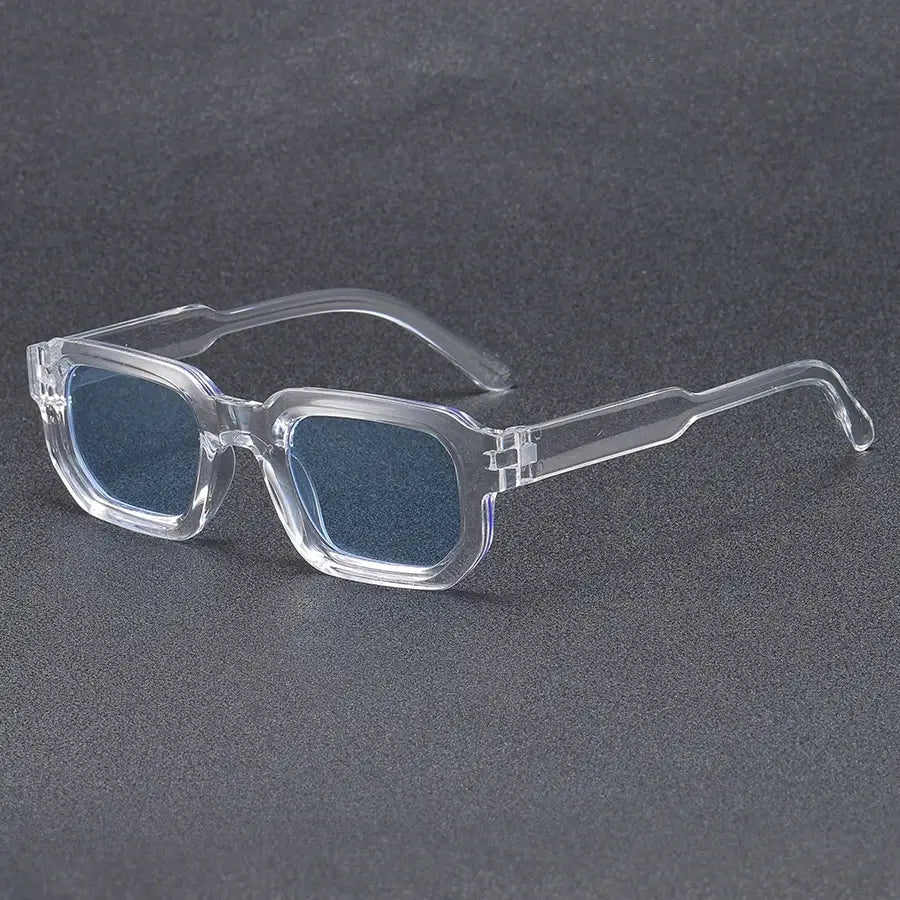 Clear plastic rectangular sunglasses with blue lenses and vintage design