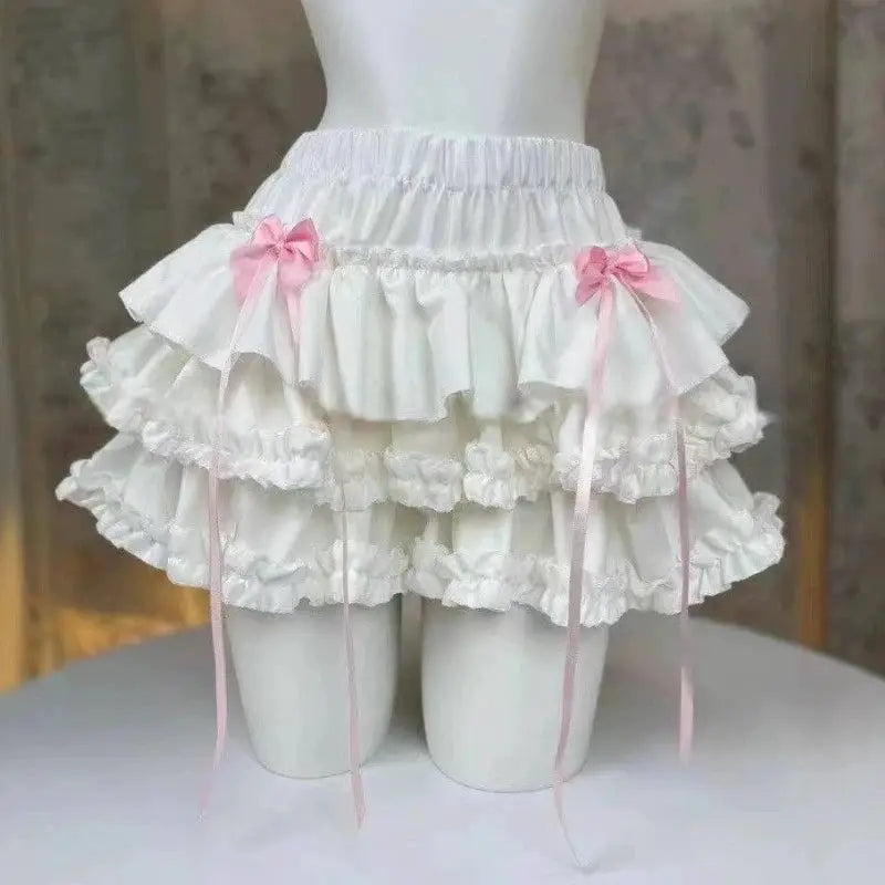 Simples Market Lolita style white cake skirt with pink bows and tiered ruffles