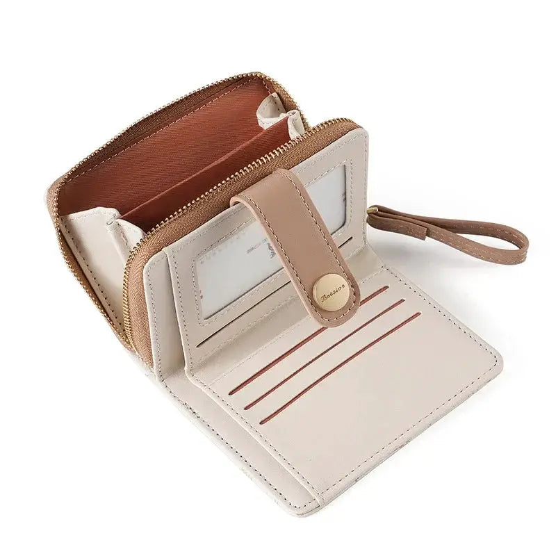 Wallet by Simples Market; beige zip-around card holder with ID window, card slots, and wrist strap