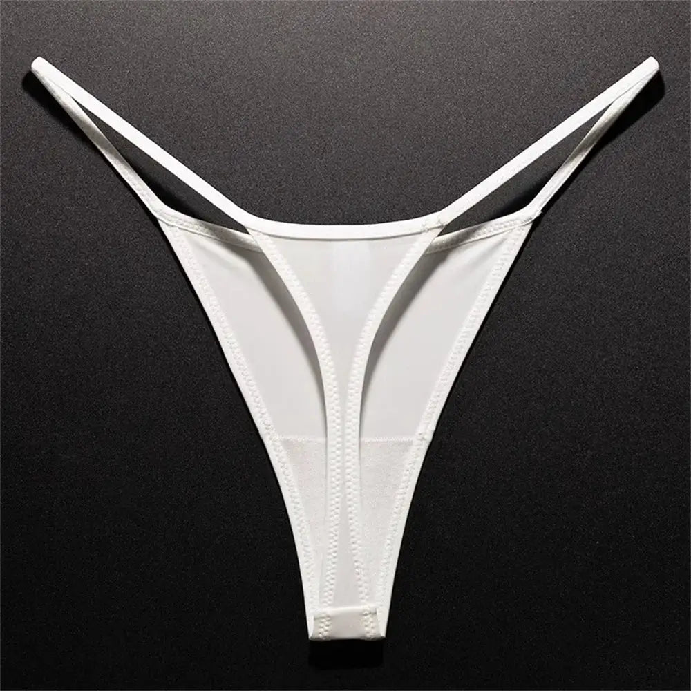 White thong underwear with slim side straps and high-cut design on a black background
