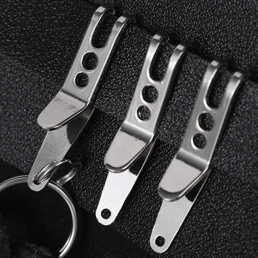 Simples Market EDC pocket suspension clip set with three silver metal carabiner clips and a keyring on black fabric
