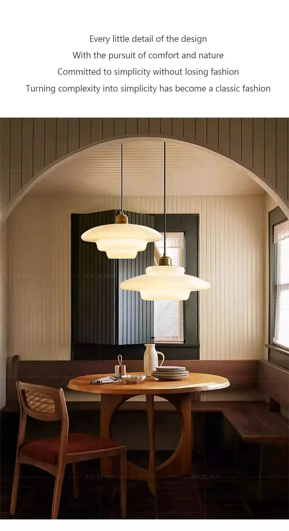Nordic glass pendant lamps with brass hardware, two white layered shades over a round wooden dining table