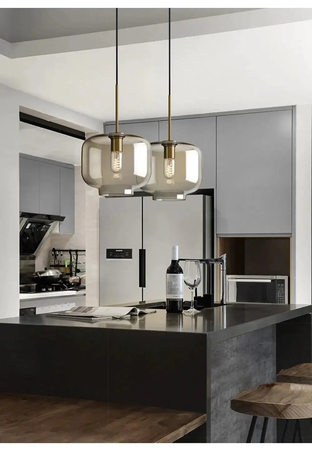 Nordic LED glass chandelier pendant lights, dual-head with smoky glass globes and brass accents over kitchen island