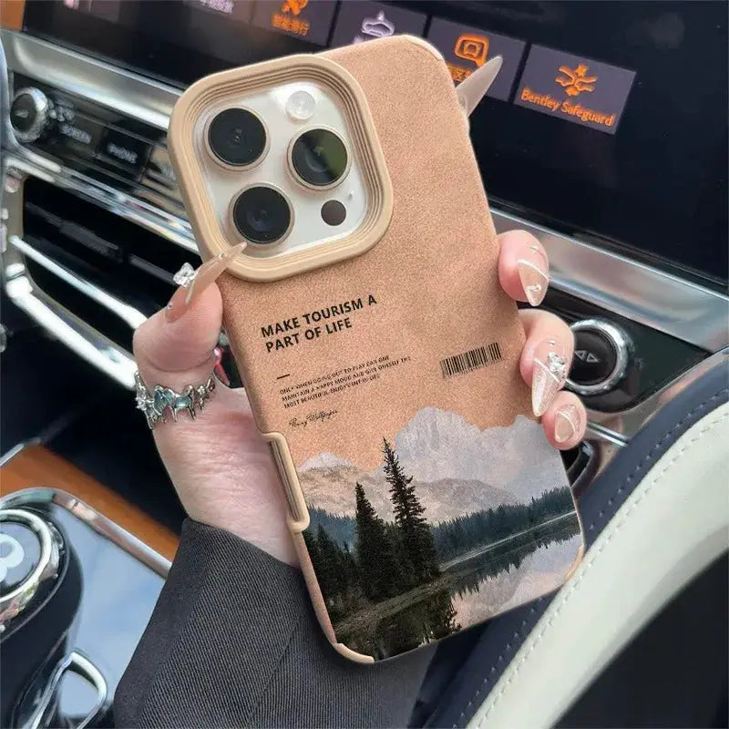 Simples Market faux leather iPhone case in tan with mountain lake scenery