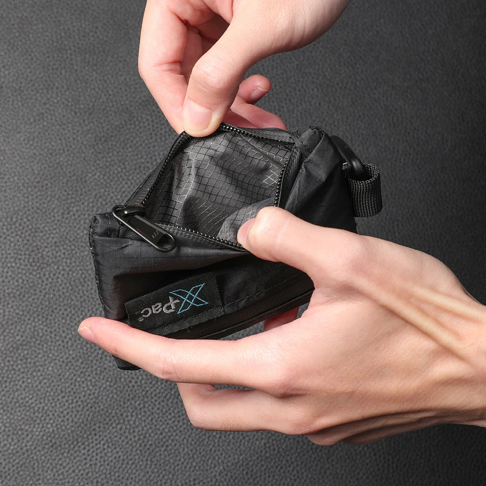 EDC 5-pocket X-PAC wallet with YKK zipper, black compact coin/card pouch held in hands