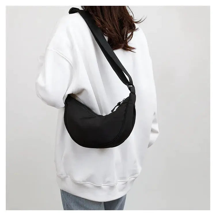 Nylon fabric zipper crossbody bag by Simples Market, black crescent dumpling shape with large capacity