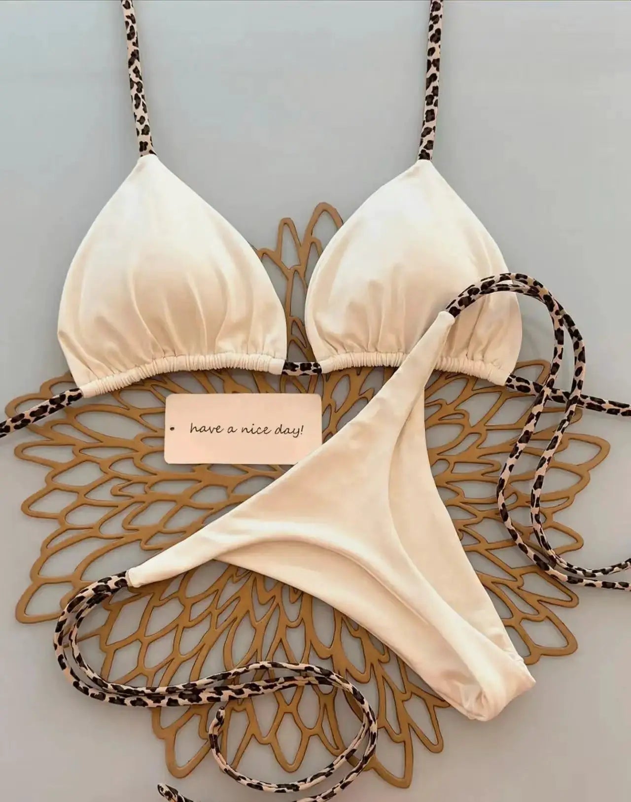Leopard-print two-piece bikini set with beige triangle top and thong bottom, Simples Market