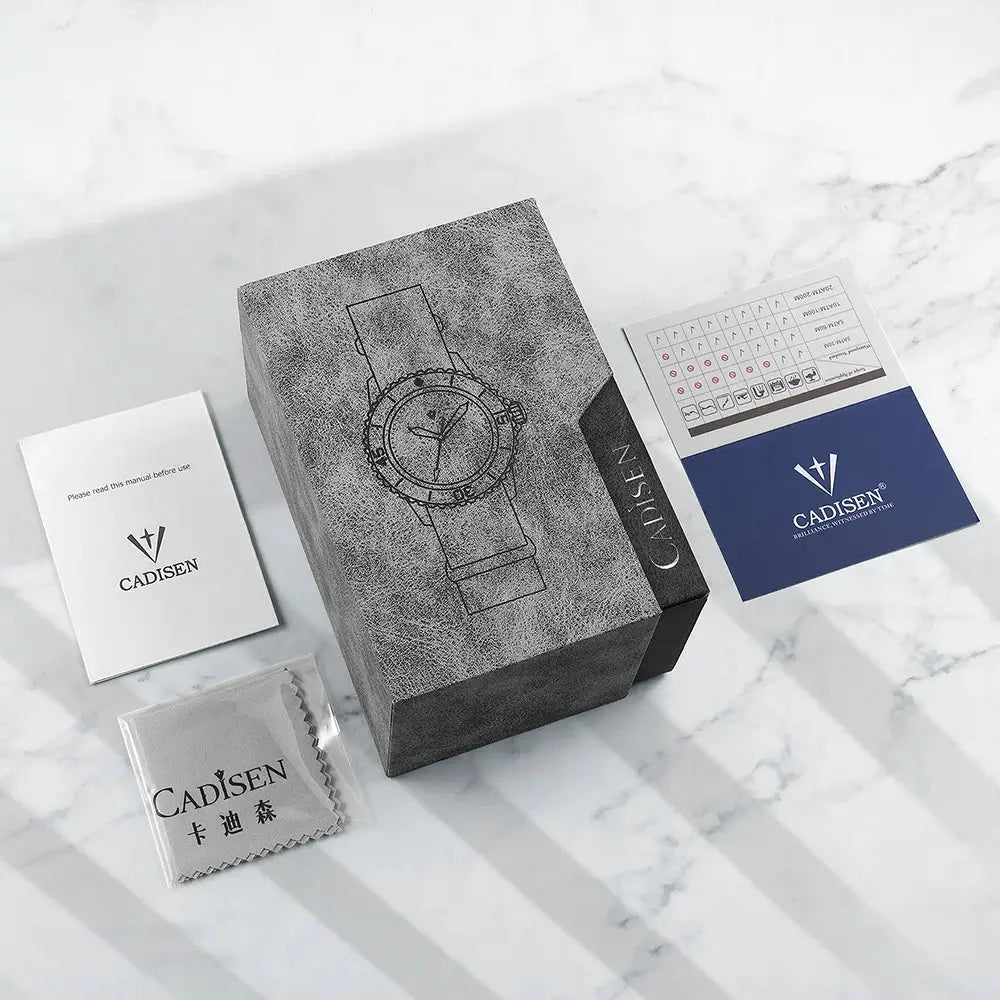 CADISEN men's watch box set with instruction manual, cleaning cloth, and info cards.