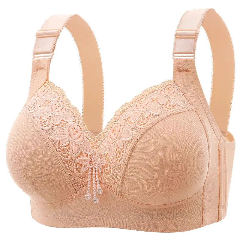 Womens lace bralette bra in nude peach color with floral lace overlay and bow accent