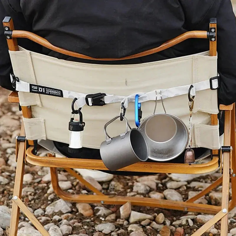Simples Market outdoor crossbody strap with adjustable length, beige fabric panel, metal hooks and pockets.