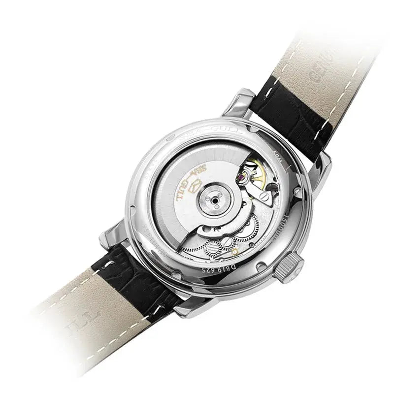 Men's automatic wristwatch with stainless steel case back, transparent back revealing Seagull ST25 movement, black leather strap