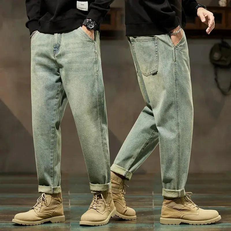 Pair of men's loose harem denim cargo pants by Simples Market, light-green denim with rolled cuffs.