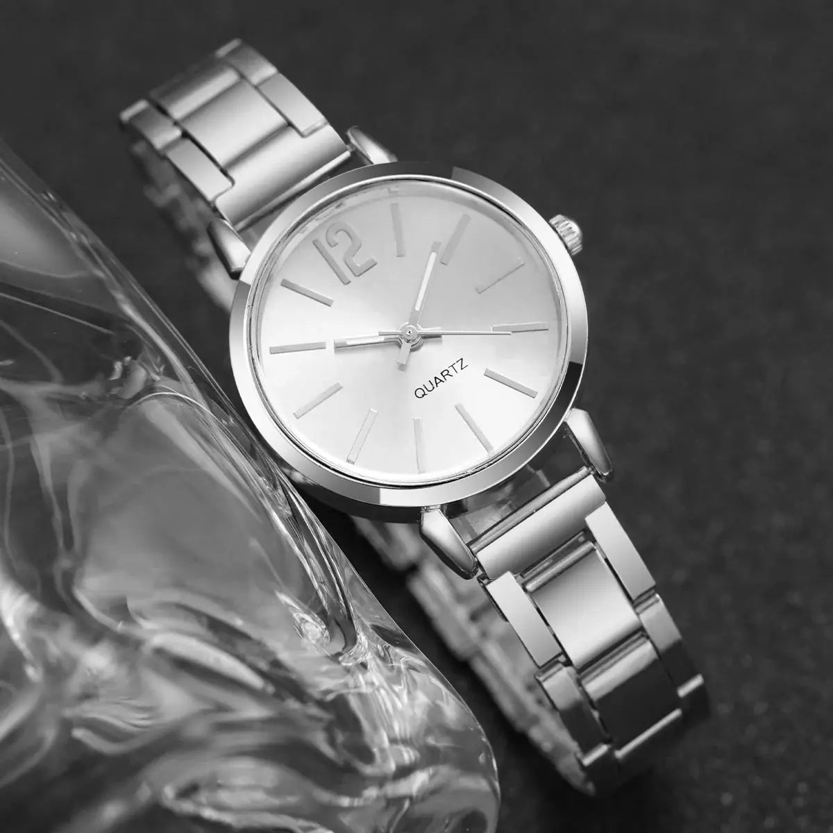 6-piece women's quartz watch set in silver stainless steel with metal bracelet.