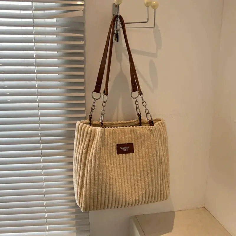 Women corduroy shoulder bag by Simples Market in solid beige with fixed brown leather straps