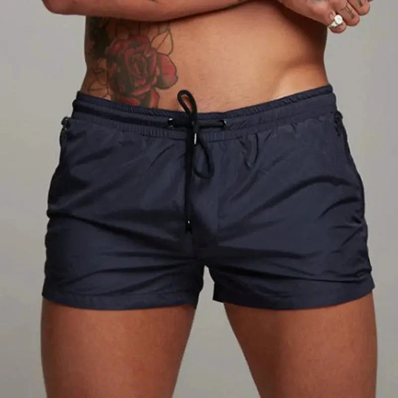 Men's navy boxer swim trunks with black drawstring for beachwear