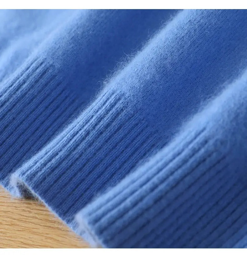 Men's blue mink cashmere sweater knit with ribbed cuffs close-up fabric