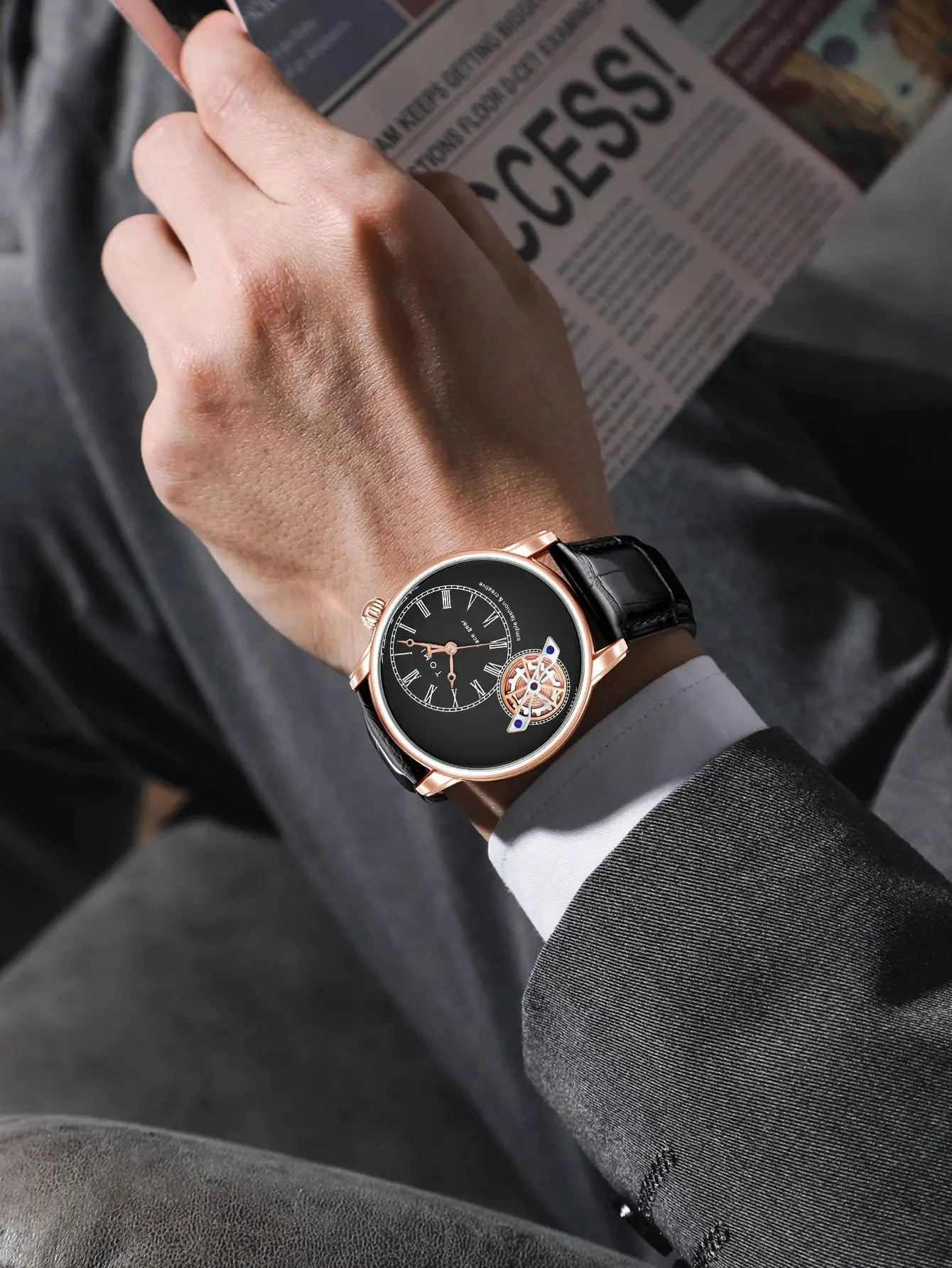 TOMI men's quartz watch with rose-gold case, black dial with Roman numerals, and black leather strap