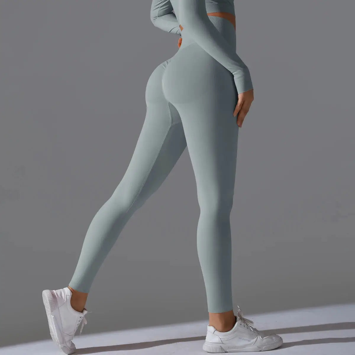 Women's seamless yoga leggings in teal, high-waist tummy-control with scrunch butt lift