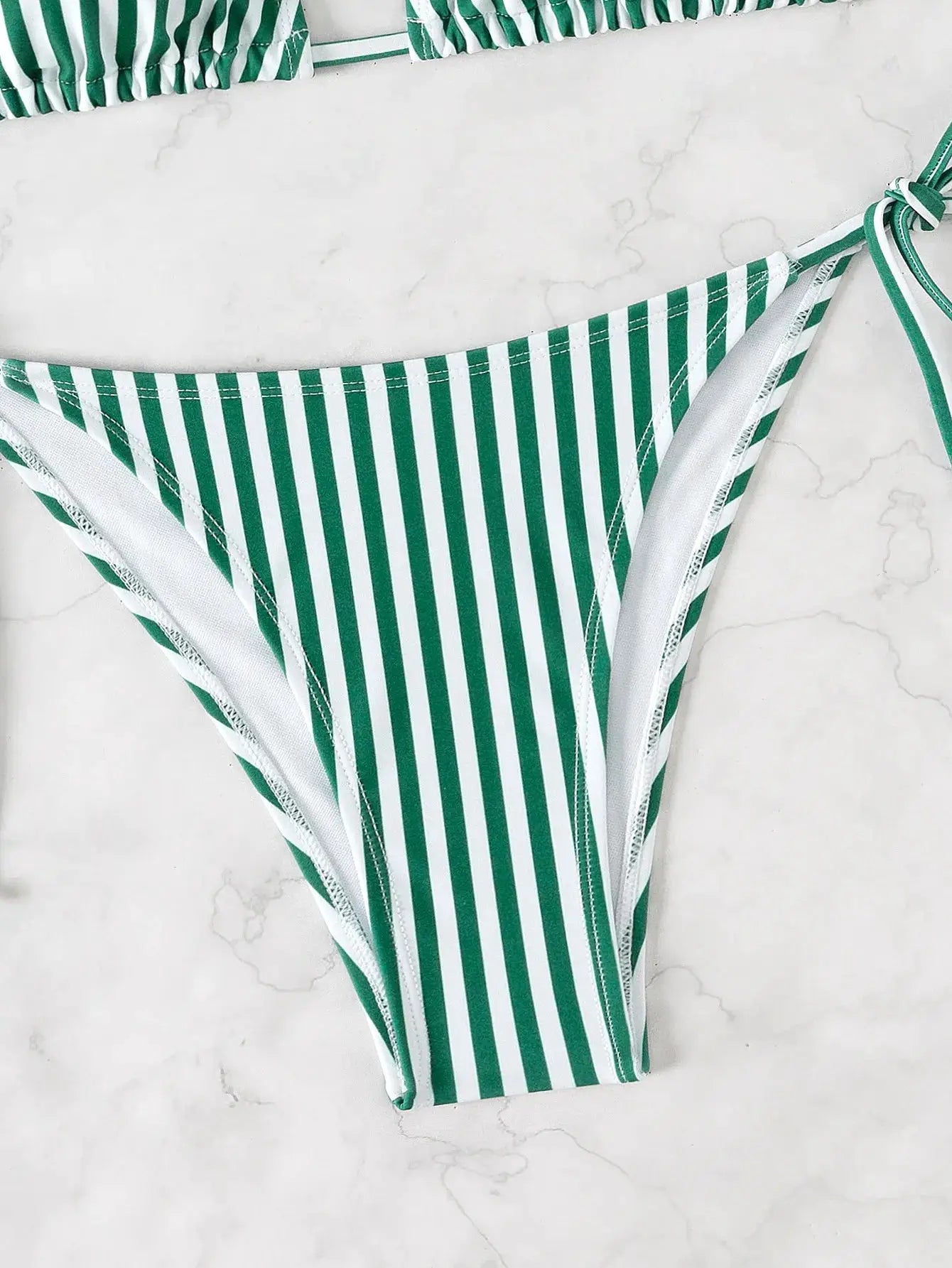 Triangle bikini bottoms in green and white stripes with side ties
