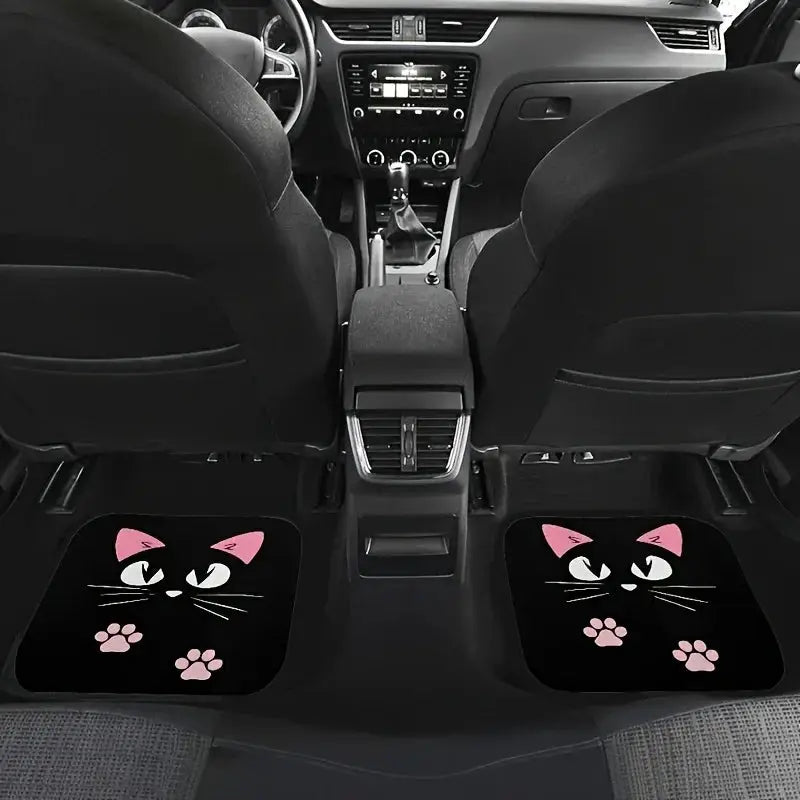 Two black car floor mats with pink cartoon cat faces and paw prints for front and rear seats.
