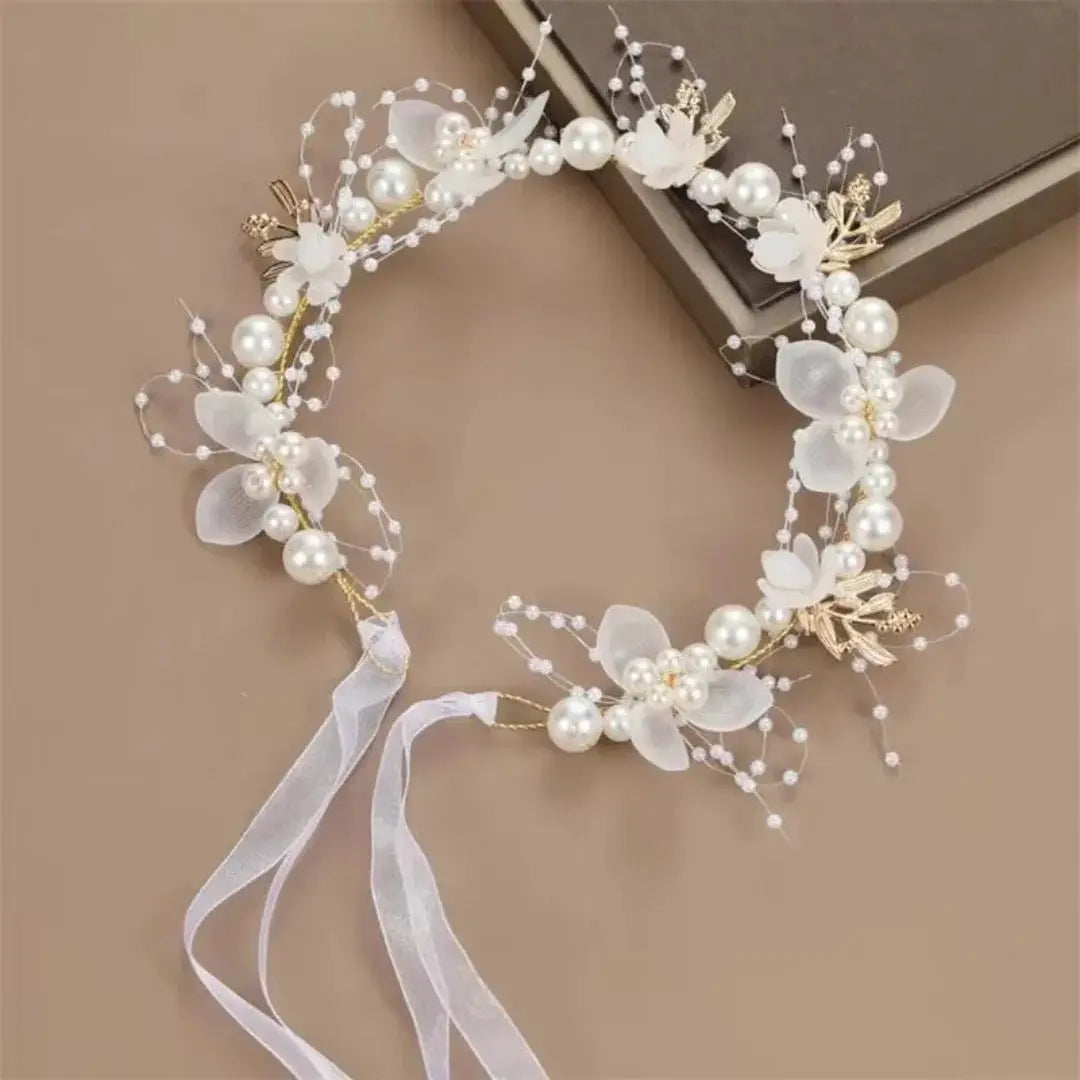 Spring Bohemian Pearl Hair Crown for Girls with white flowers, pearls, gold accents, and ribbons
