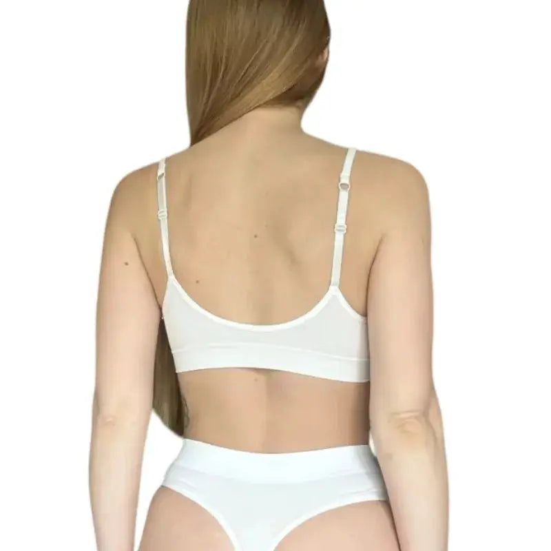 White lingerie set shown from the back: women's bra with adjustable straps and high-rise briefs