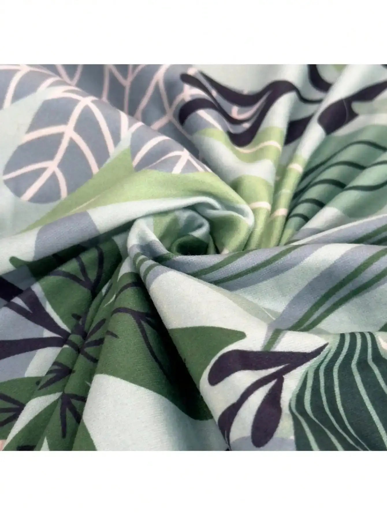 Outdoor tropical print sofa cushion cover by Simples Market, green and grey non-slip fabric.