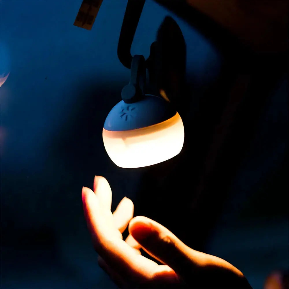 Super Mini Retro Snow Camping Lantern by Simples Market, rechargeable hanging light with blue top and warm white glow