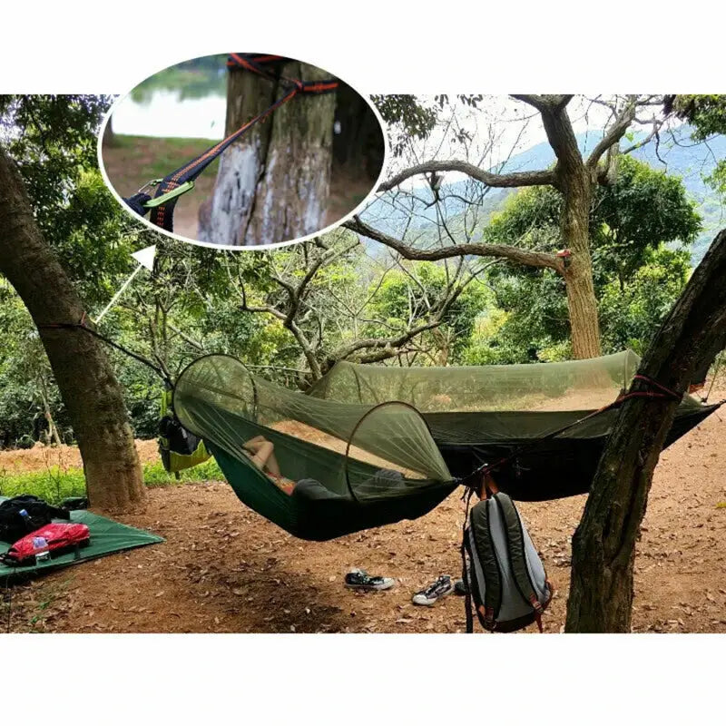 Hammock straps 2-pack; orange and black polyester with rings, rated 600lbs for secure tree-to-tree hang.
