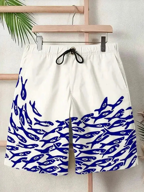 Men's swim shorts with white base and bold blue wave print, drawstring waist